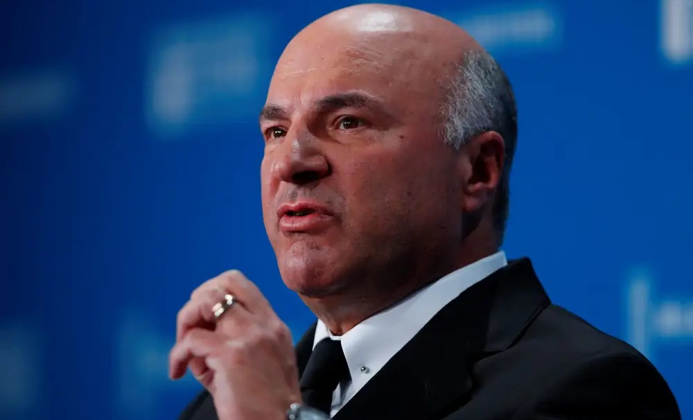 “Rising interest rates could lead to market chaos,” warns Kevin O’Leary.  Here are two “strong buy” stocks to protect your portfolio