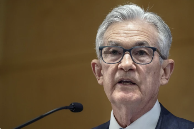 Fed’s Powell notes inflation is easing but downplays discussion of interest rate cuts